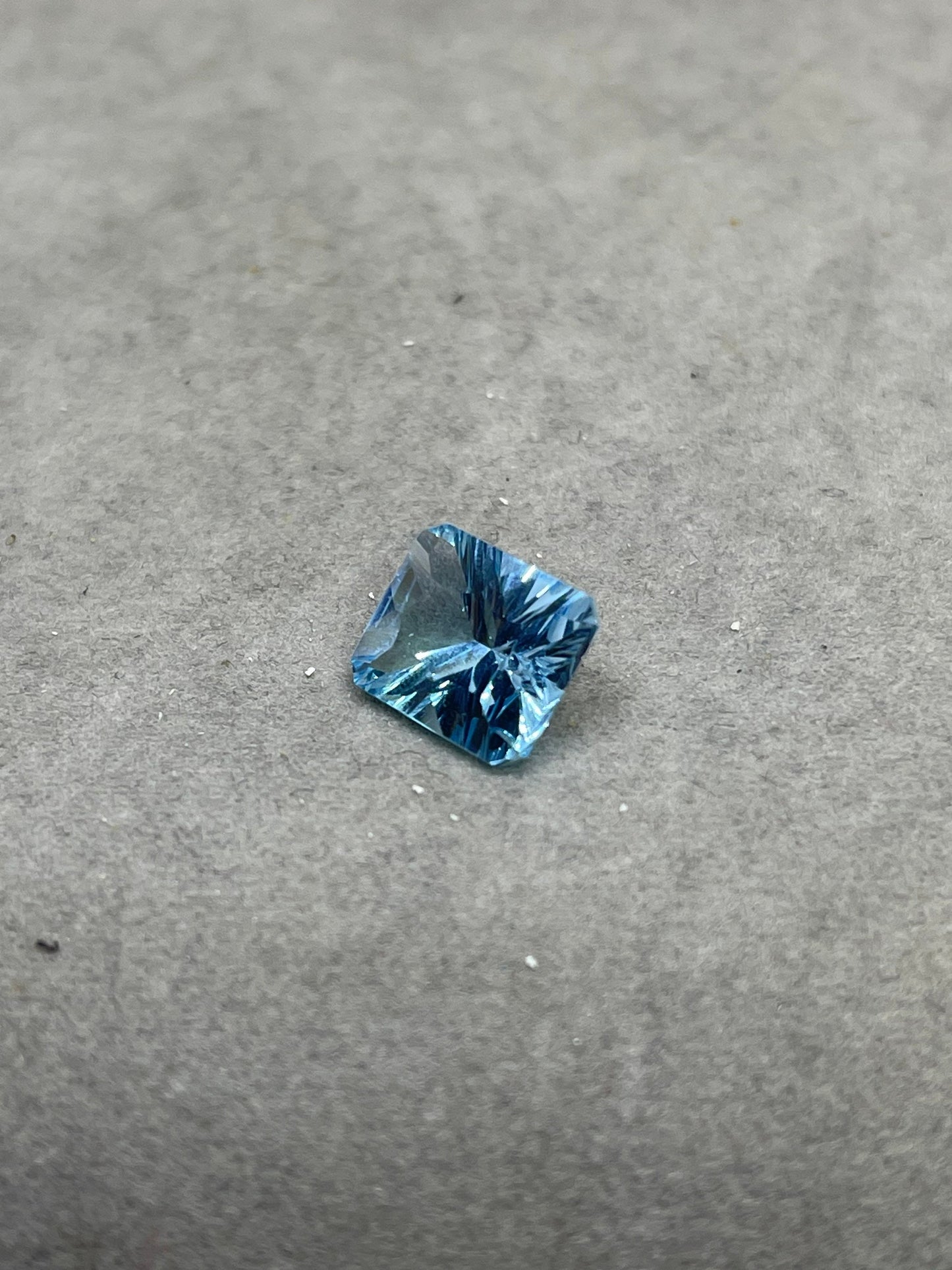 Laser Concave Cut Swiss Blue Topaz 12x10x7 Emerald Cut Loose Gemstone