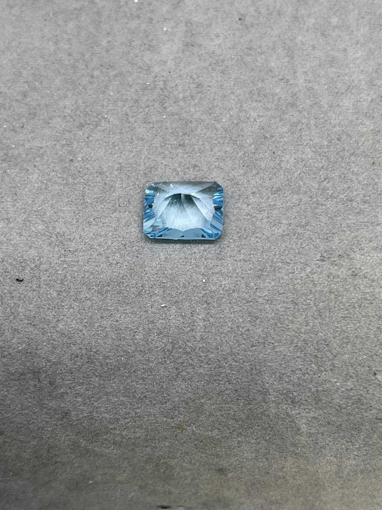 Laser Concave Cut Swiss Blue Topaz 12x10x7 Emerald Cut Loose Gemstone
